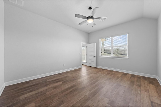 interior space with ceiling fan, dark hardwood / wood-style flooring, and vaulted ceiling