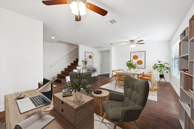 living room with dark hardwood / wood-style flooring