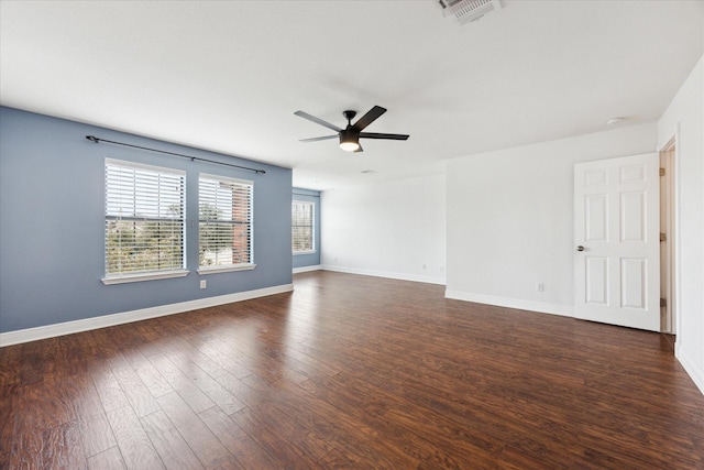 unfurnished room with dark hardwood / wood-style floors and ceiling fan