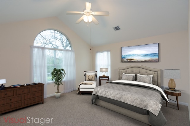 bedroom featuring lofted ceiling, ceiling fan, and carpet flooring