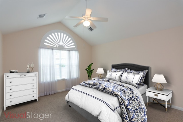 carpeted bedroom featuring vaulted ceiling and ceiling fan