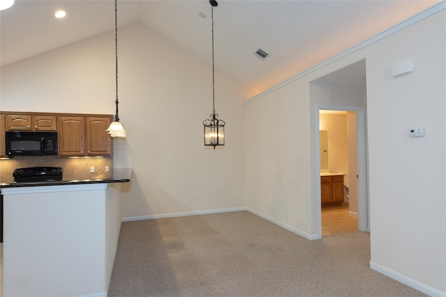 kitchen featuring decorative light fixtures, high vaulted ceiling, light carpet, and backsplash