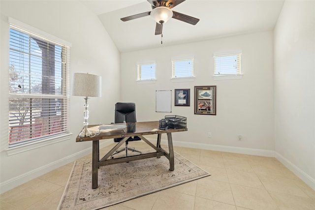 tiled office with ceiling fan and vaulted ceiling