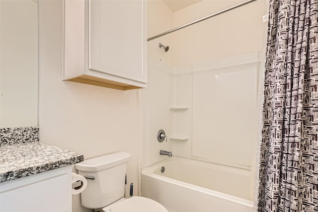 full bathroom featuring shower / bath combo with shower curtain, toilet, and vanity