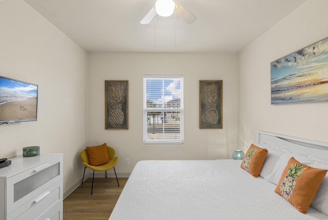 bedroom with ceiling fan and light hardwood / wood-style flooring