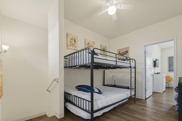 bedroom featuring ceiling fan and dark hardwood / wood-style floors