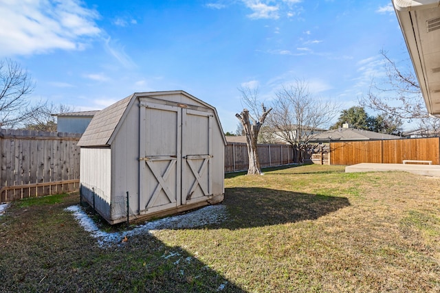 view of outbuilding with a yard