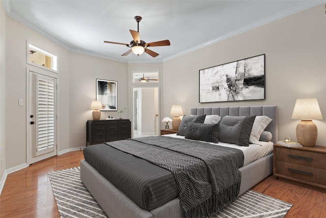 bedroom with ceiling fan, crown molding, and light wood-type flooring