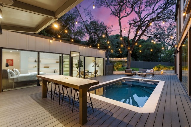 3305 Thousand Oaks Cv, Austin, TX 78746 - view of swimming pool with a wooden deck and outdoor lounge area