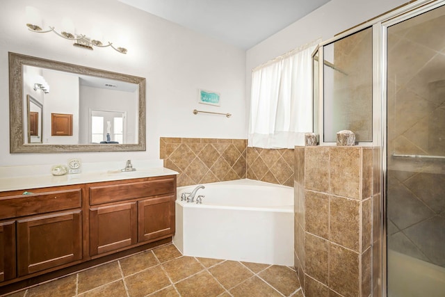 bathroom featuring vanity and plus walk in shower