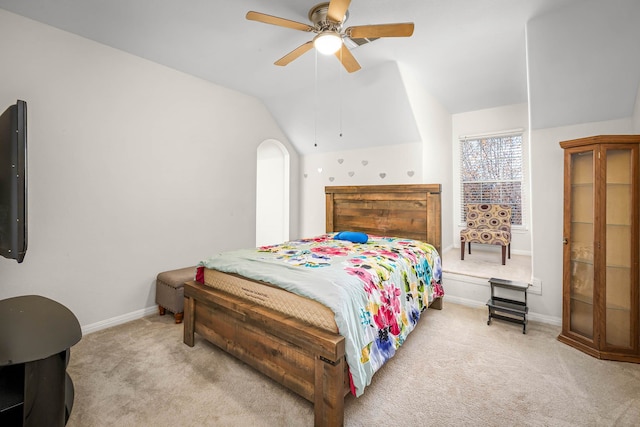 carpeted bedroom featuring ceiling fan and lofted ceiling