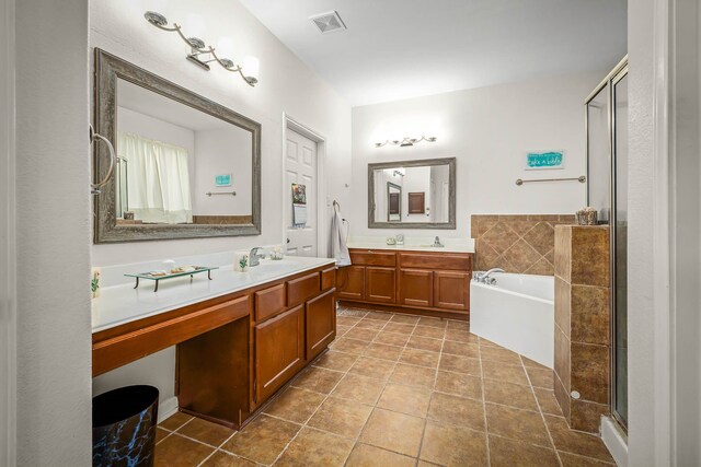 bathroom with vanity, separate shower and tub, and tile patterned flooring