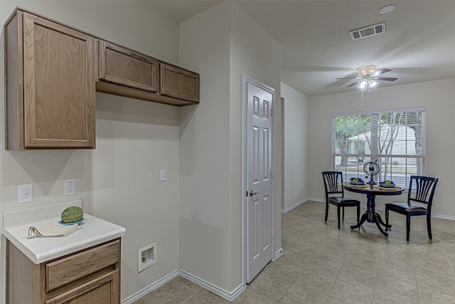 kitchen featuring ceiling fan