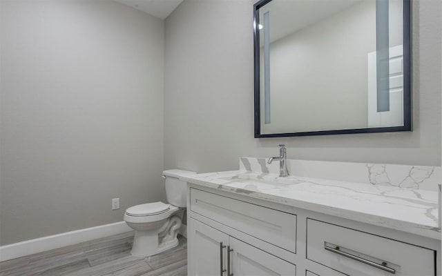 2718 Leslie Ln, San Marcos, TX 78666 - bathroom featuring wood finished floors and vanity