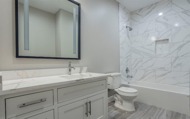 2718 Leslie Ln, San Marcos, TX 78666 - bathroom with vanity, washtub / shower combination, and wood finished floors