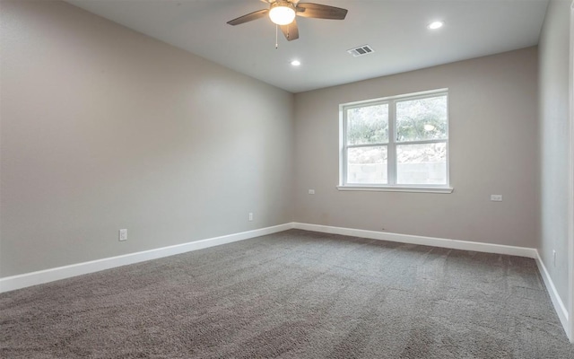 2718 Leslie Ln, San Marcos, TX 78666 - empty room featuring a ceiling fan, dark carpet, and recessed lighting