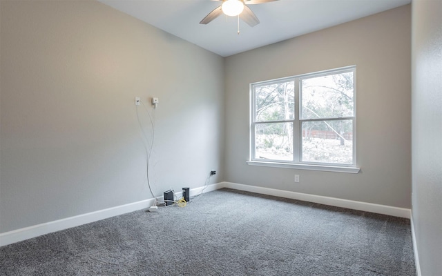 carpeted empty room with ceiling fan