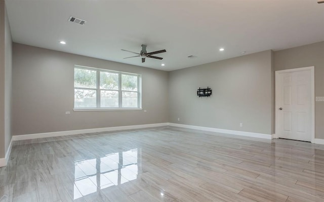 2718 Leslie Ln, San Marcos, TX 78666 - unfurnished room with ceiling fan, recessed lighting, and light wood-style flooring