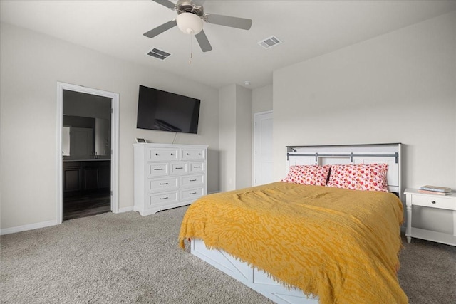 carpeted bedroom with ceiling fan and connected bathroom