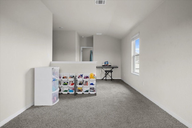 rec room with carpet and lofted ceiling