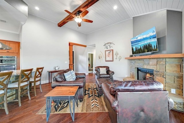 living room with a fireplace, wood-type flooring, wood ceiling, vaulted ceiling with beams, and ceiling fan