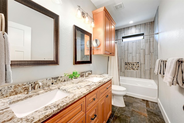 full bathroom featuring shower / bath combo with shower curtain, toilet, and vanity