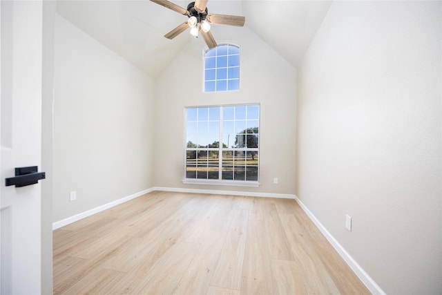 spare room featuring ceiling fan, vaulted ceiling, and light hardwood / wood-style floors