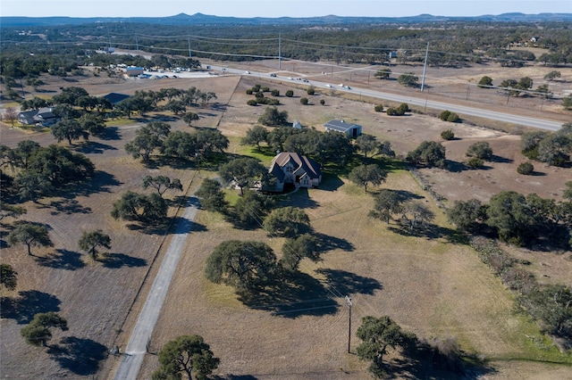 aerial view featuring a mountain view and a rural view