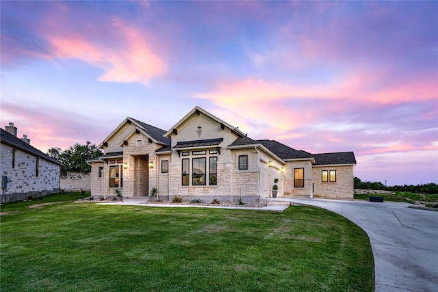 view of front of home featuring a yard