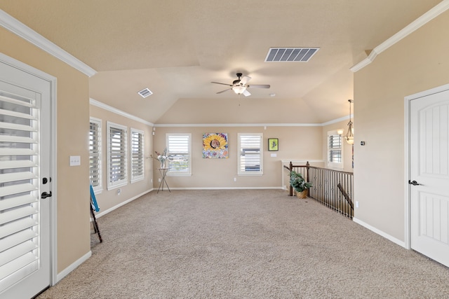 unfurnished living room featuring vaulted ceiling, carpet, and ornamental molding