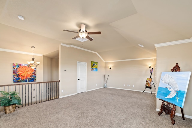 living area featuring vaulted ceiling, baseboards, carpet flooring, and crown molding