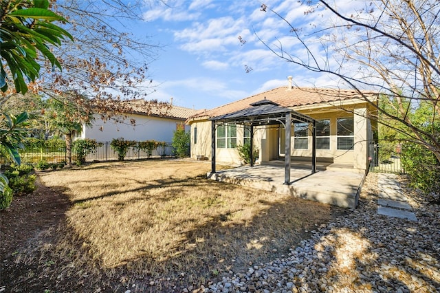11716 Shadestone Ter, Austin, TX 78732 - back of house featuring a gazebo, a patio, stucco siding, and a tiled roof