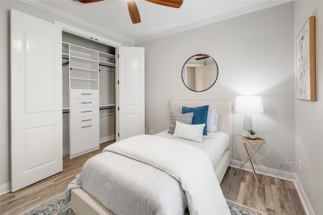 11716 Shadestone Ter, Austin, TX 78732 - bedroom featuring light wood finished floors, baseboards, ornamental molding, a closet, and ceiling fan