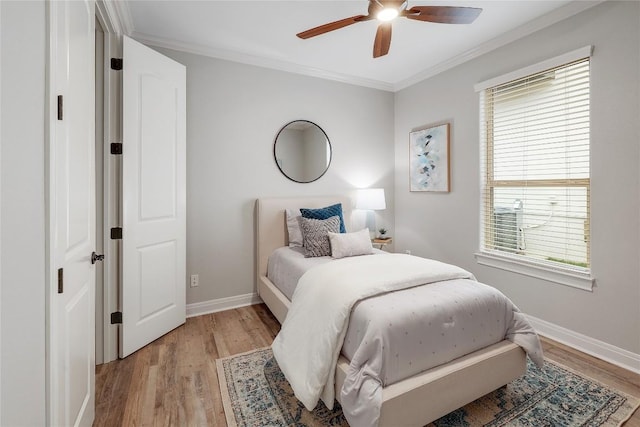 11716 Shadestone Ter, Austin, TX 78732 - bedroom with baseboards, light wood-style floors, crown molding, and ceiling fan