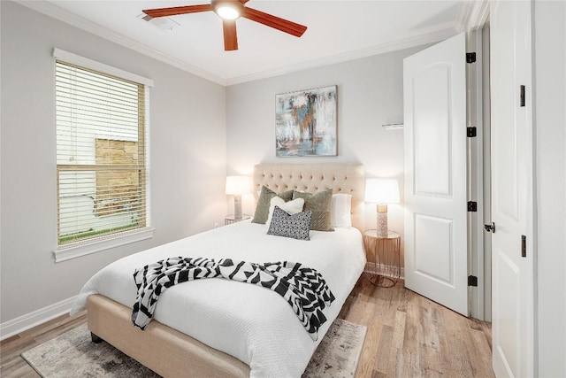 11716 Shadestone Ter, Austin, TX 78732 - bedroom featuring ornamental molding, light wood-type flooring, multiple windows, baseboards, and ceiling fan