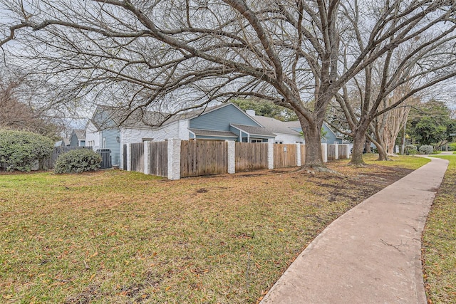 view of yard with central AC