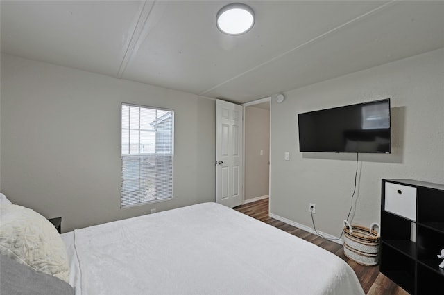 bedroom featuring dark hardwood / wood-style floors