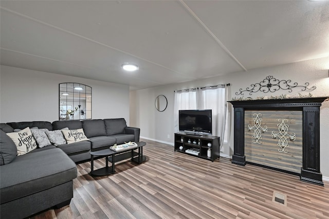 living room featuring wood-type flooring