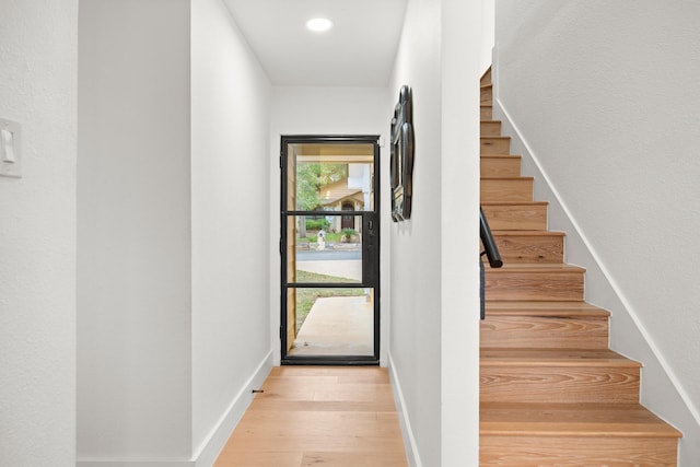 entryway with light hardwood / wood-style flooring