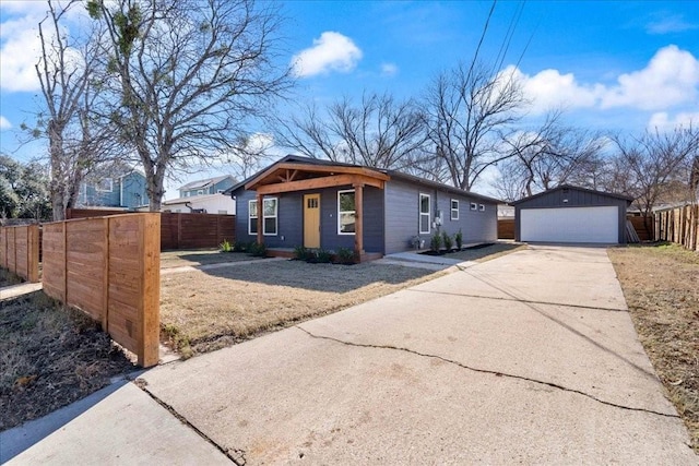 6811 Montana St, Austin, TX 78741 - view of front of home featuring an outdoor structure and a garage