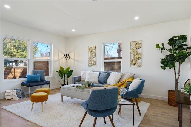 6811 Montana St, Austin, TX 78741 - living area with plenty of natural light, light wood-style floors, recessed lighting, and baseboards