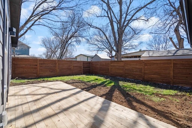 6811 Montana St, Austin, TX 78741 - wooden terrace with a fenced backyard