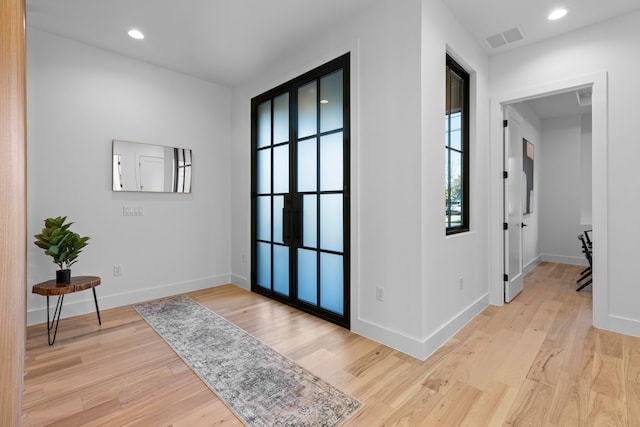 entryway with light wood-type flooring