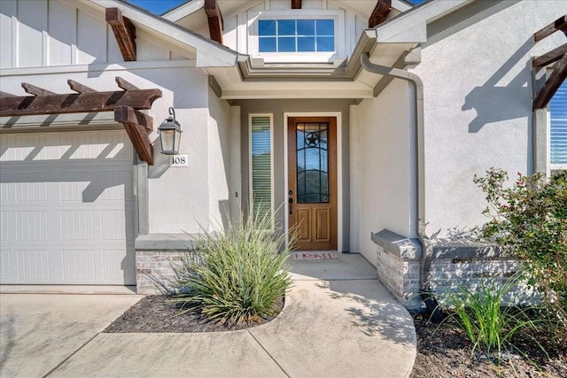 entrance to property featuring a garage