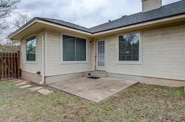 property entrance featuring a patio