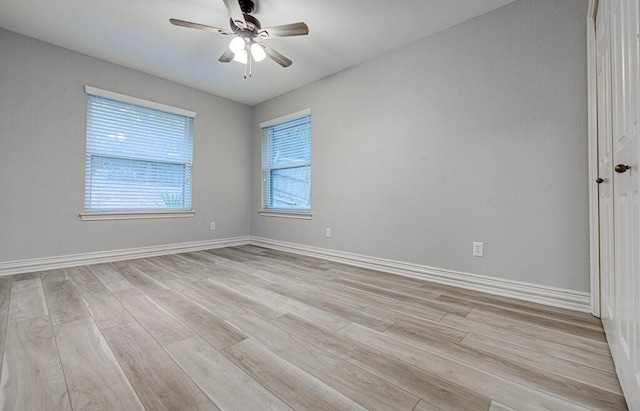 unfurnished room featuring ceiling fan and light hardwood / wood-style floors