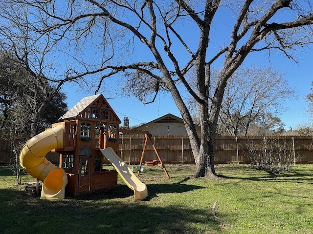 view of play area featuring a lawn