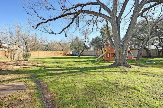 view of yard with a playground