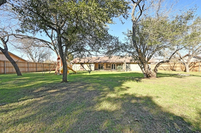 view of yard featuring a playground