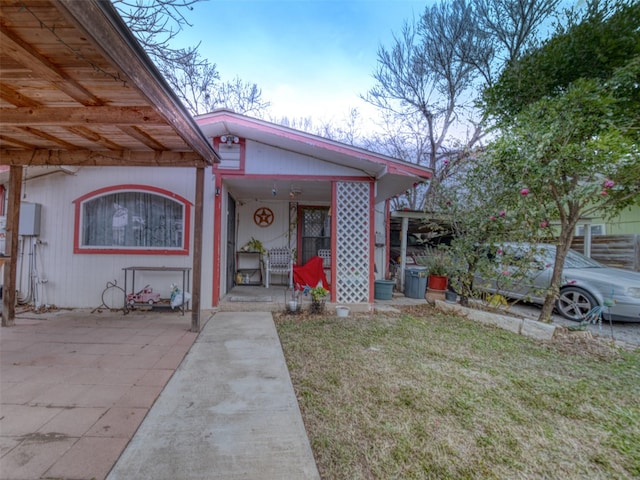 bungalow-style house featuring a front yard